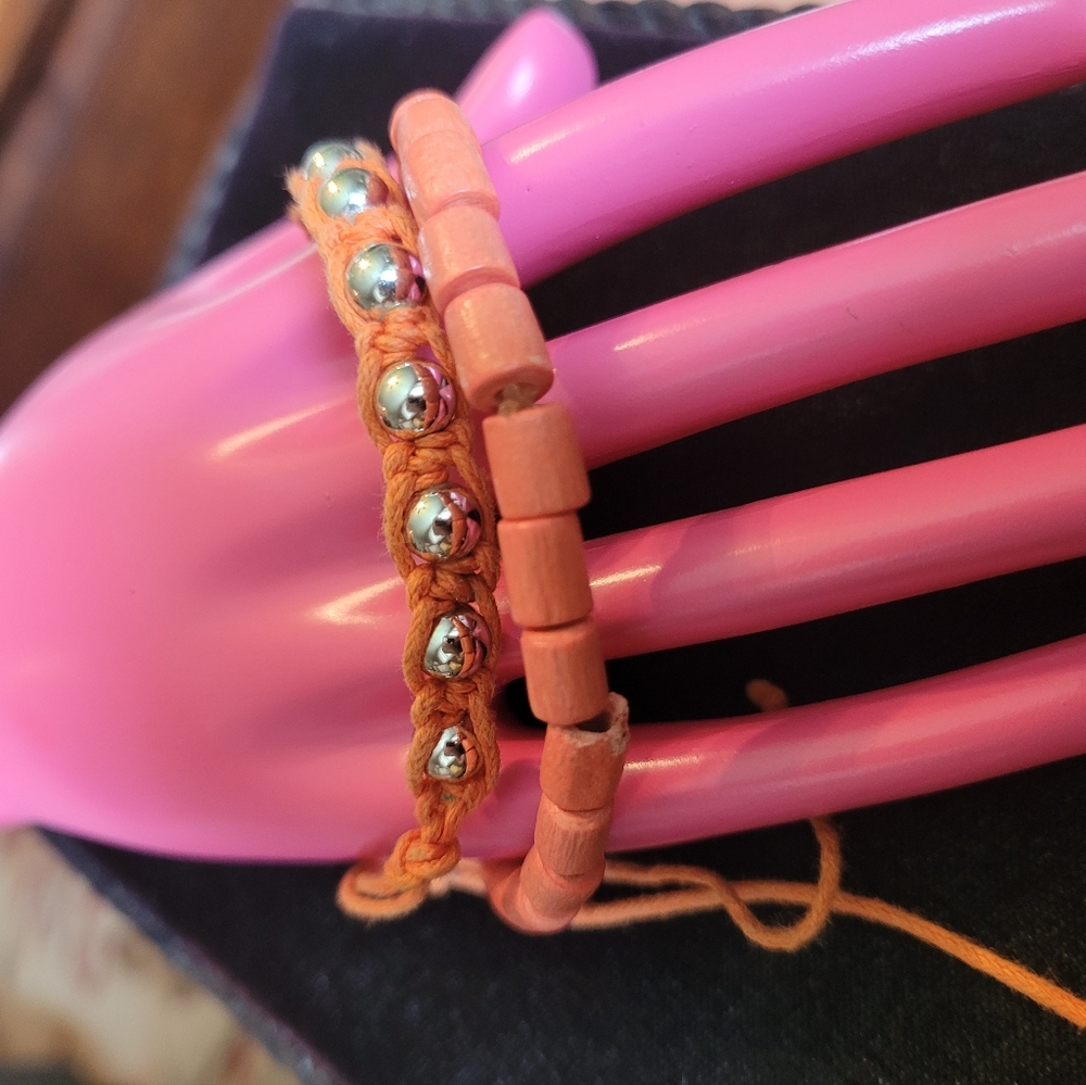Bracelets Costume Jewelry, one adjustable and one stretchy.